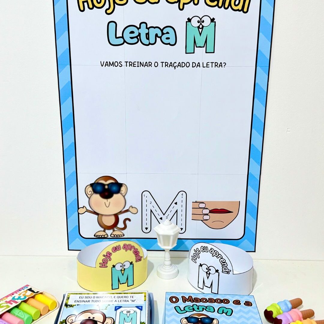 História na Caixa e Cartaz Letra “M”