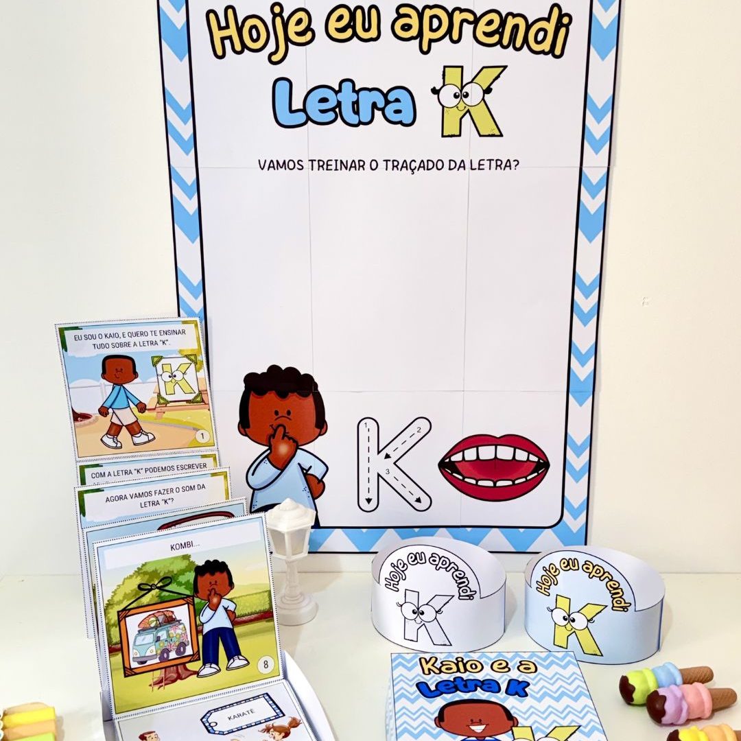 História na Caixa e Cartaz Letra “K”